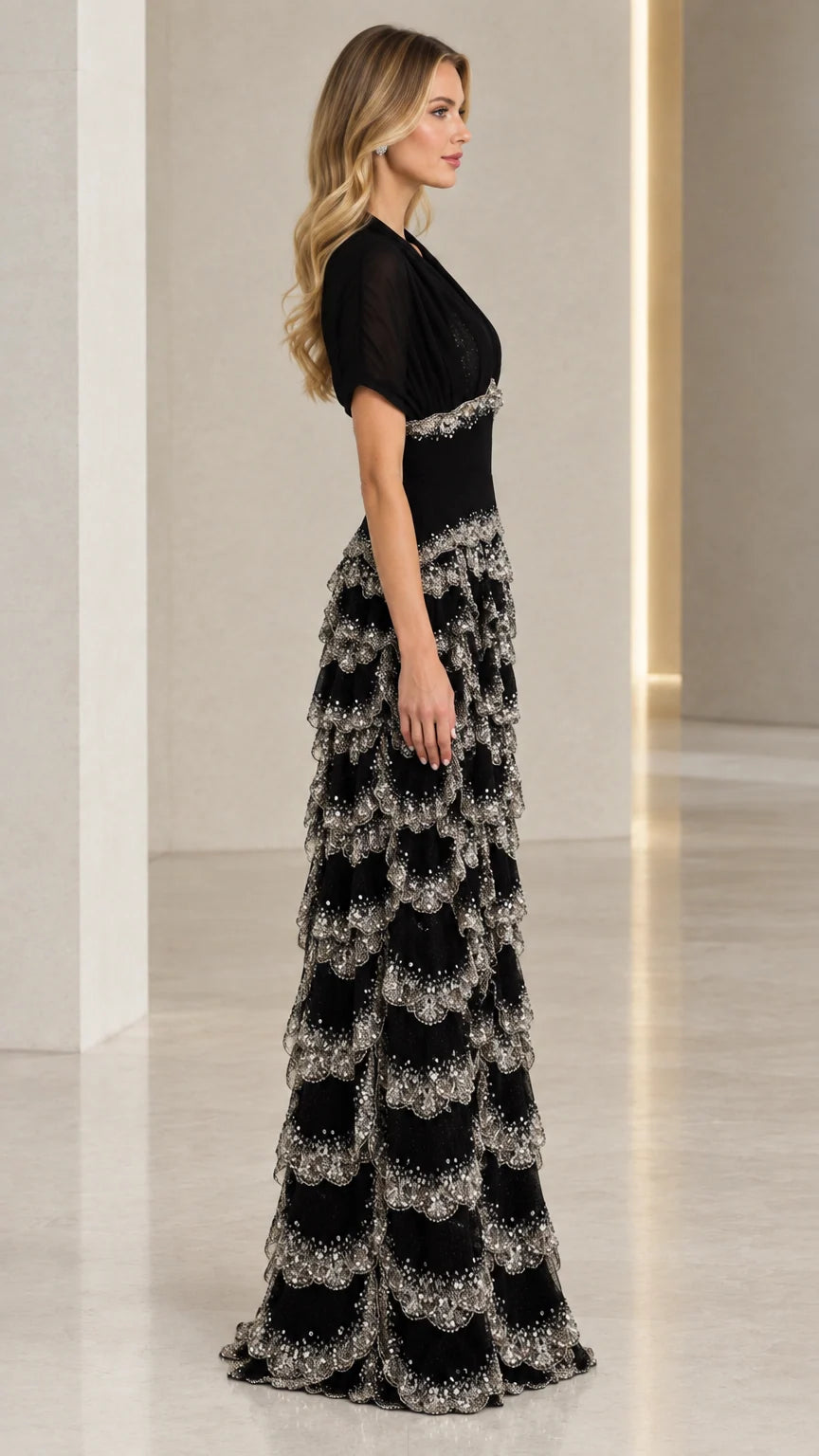 Side view of black tiered scalloped formal maxi dress