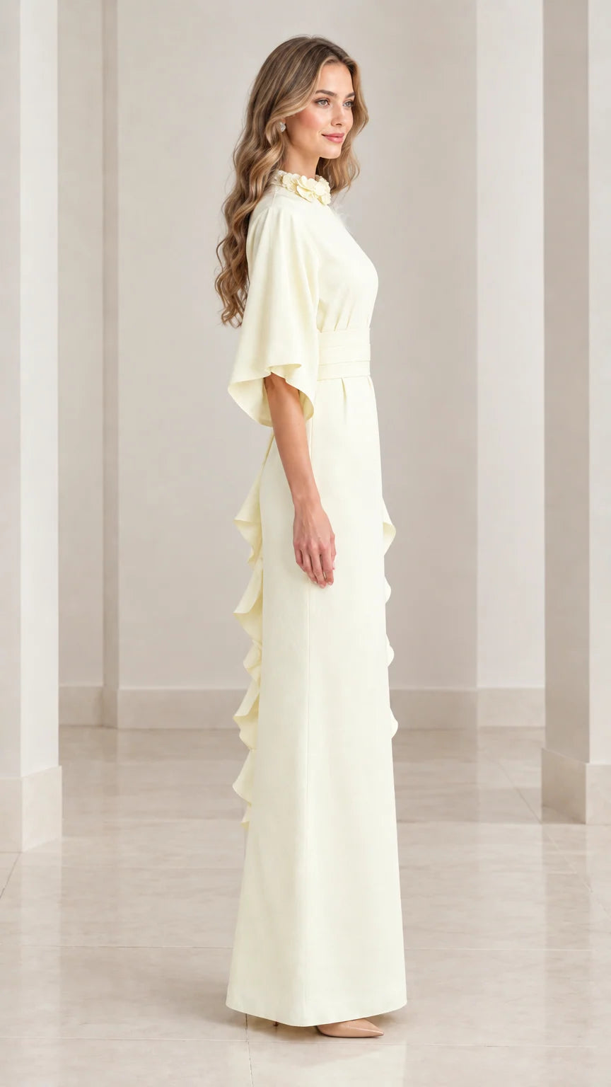 Side profile of elegant butter yellow column evening gown highlighting side ruffle detail