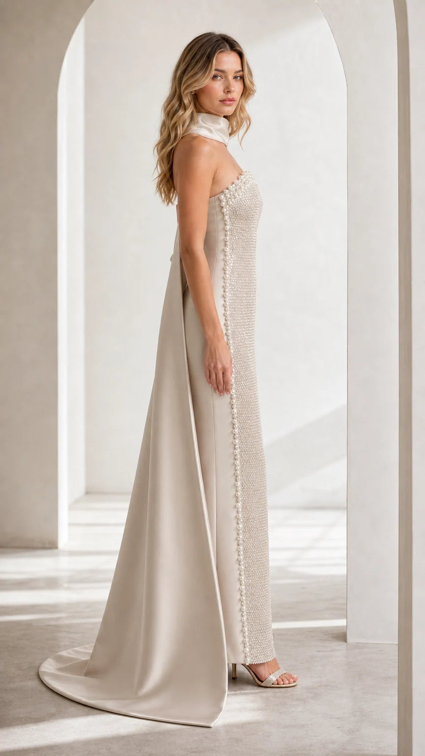 Side profile view of Champagne beaded gown showing overskirt silhouette