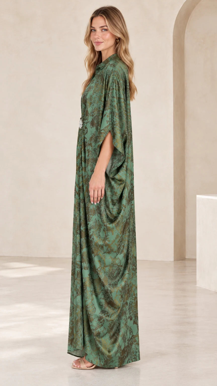 Side profile view of green draped kaftan maxi dress