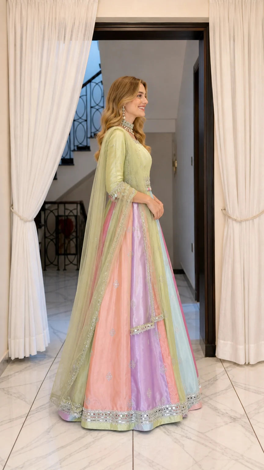 Side angle view of model wearing pastel multicolor flared ethnic maxi gown