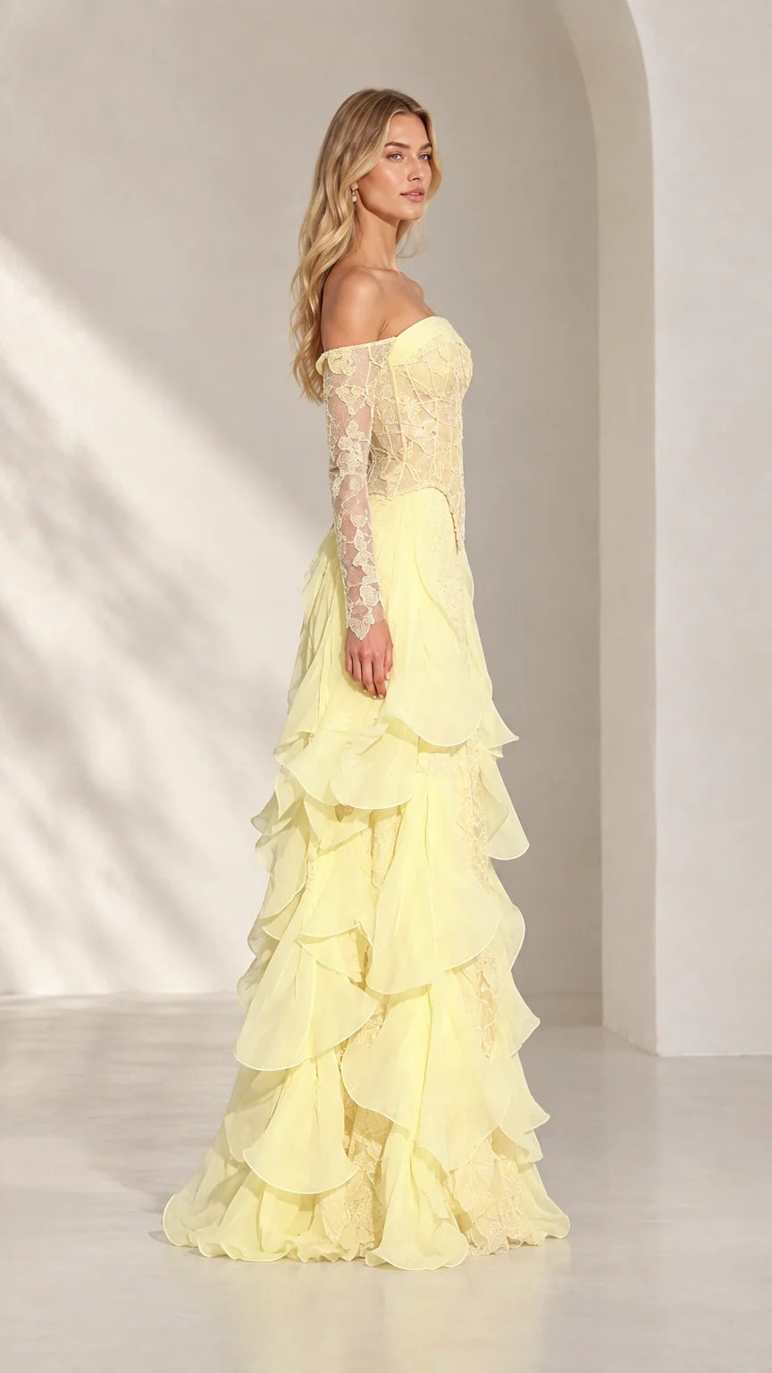 Pastel yellow off-the-shoulder evening gown with layered ruffle maxi skirt - side view
