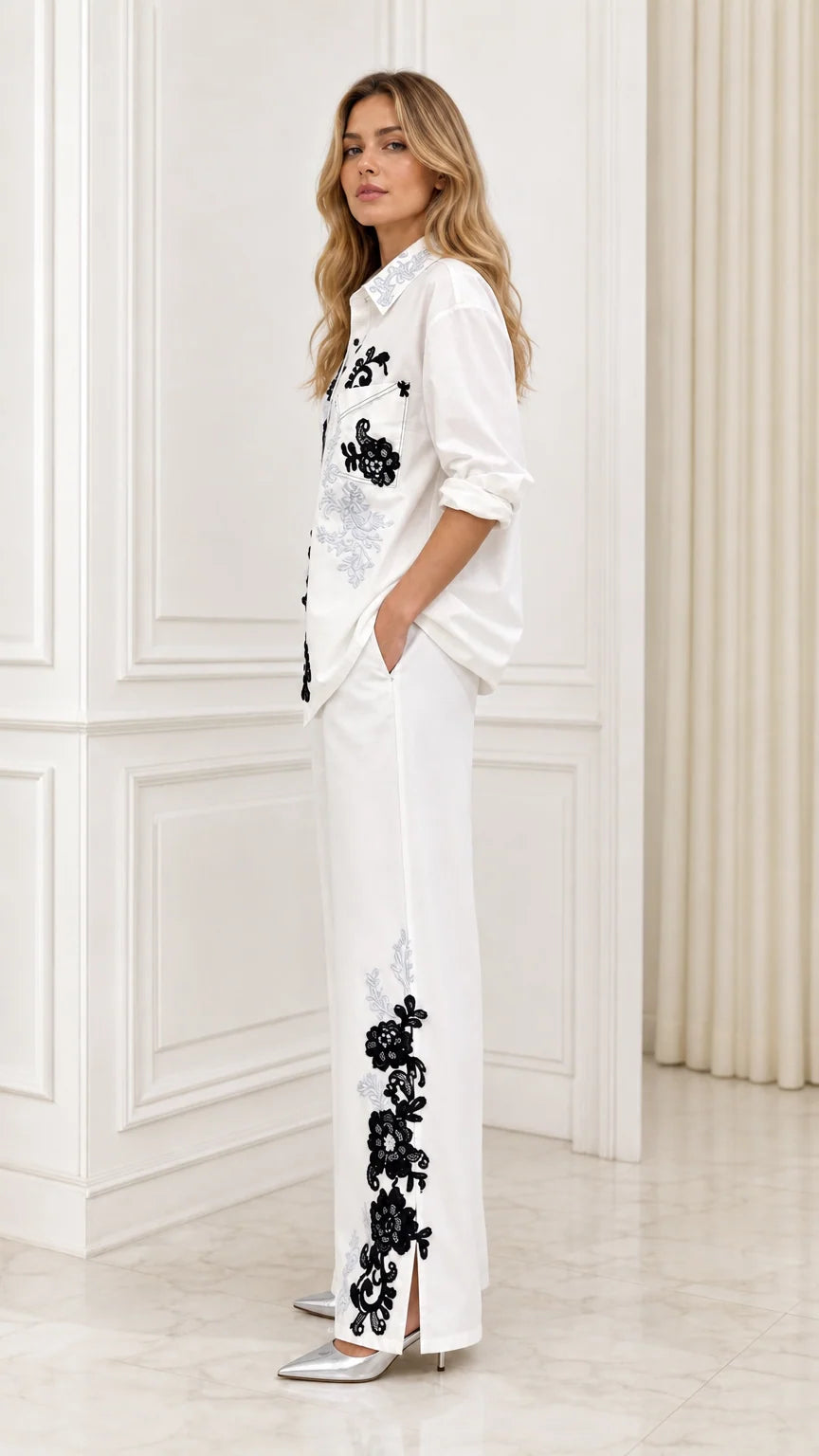 Side profile view of white two-piece embroidered set