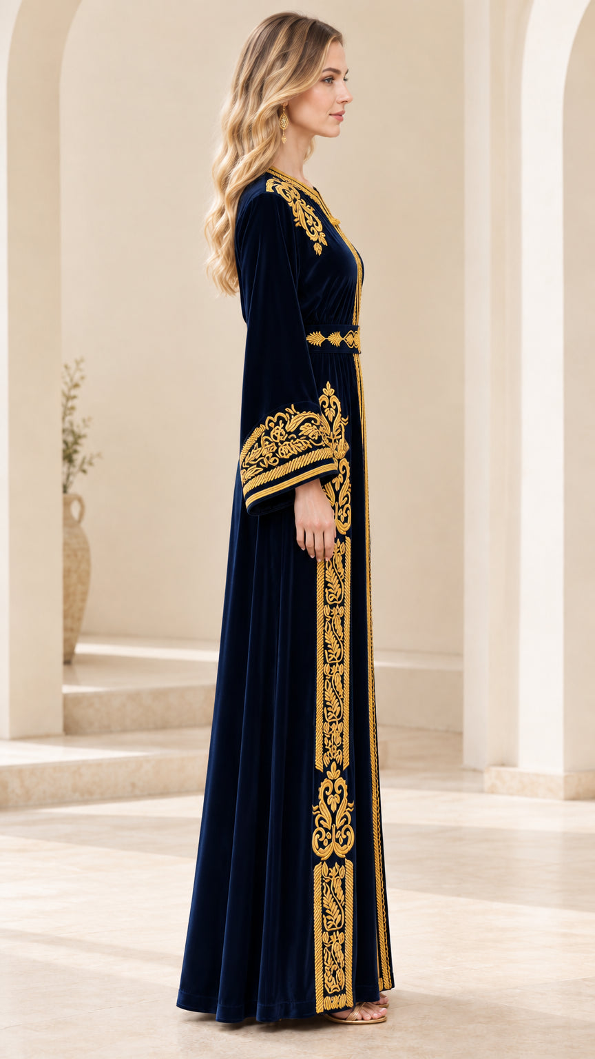 Side view of Navy Blue velvet maxi dress with gold sleeve embroidery