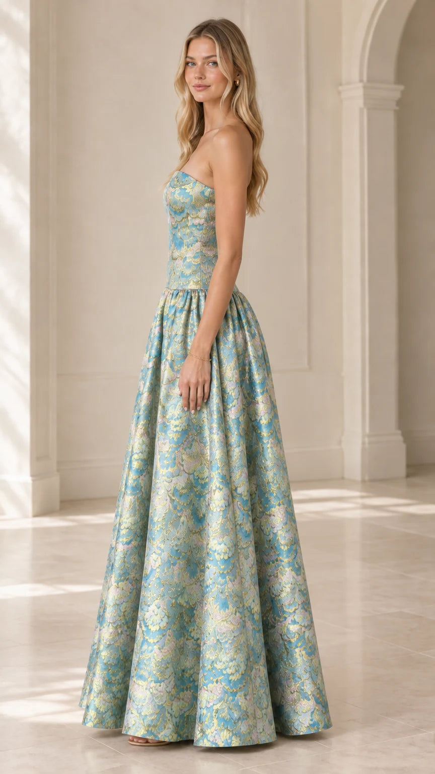 Side angle view of strapless aqua blue metallic jacquard formal evening dress