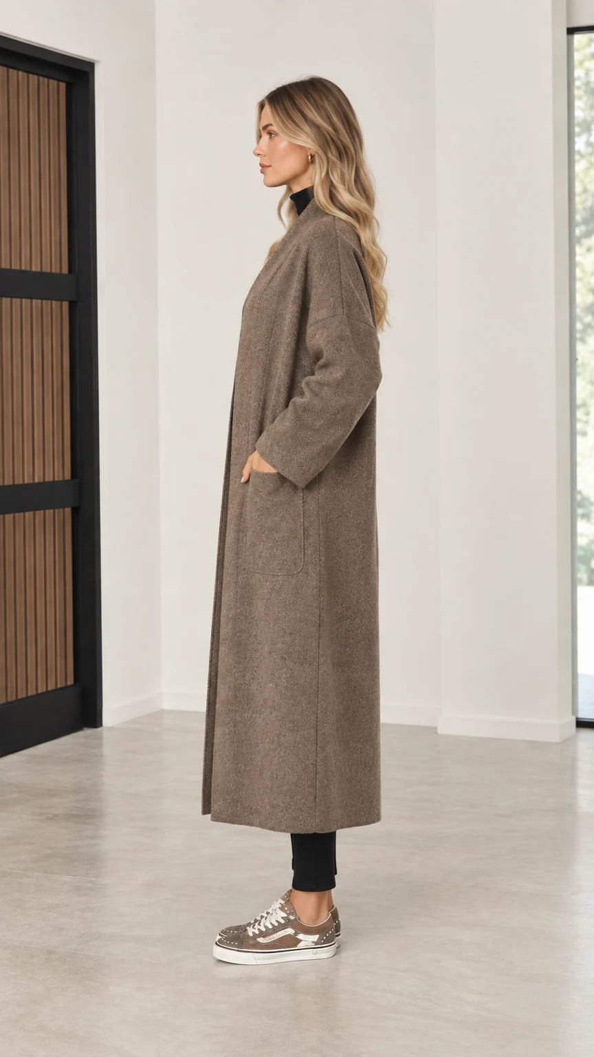 Side profile of model wearing mocha maxi duster coatigan