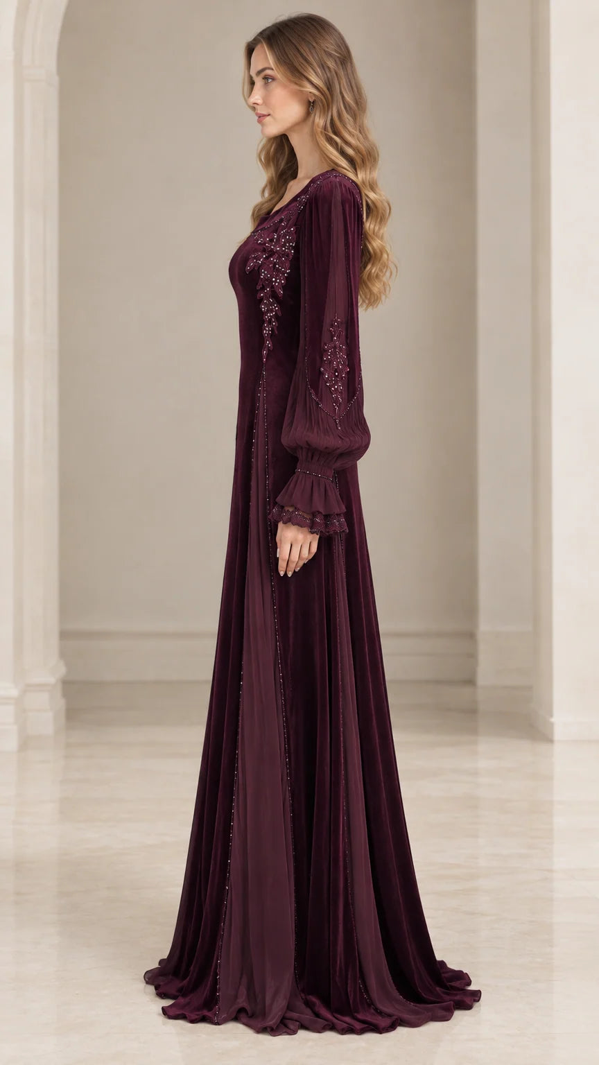 Side profile of burgundy beaded velvet floor-length formal dress