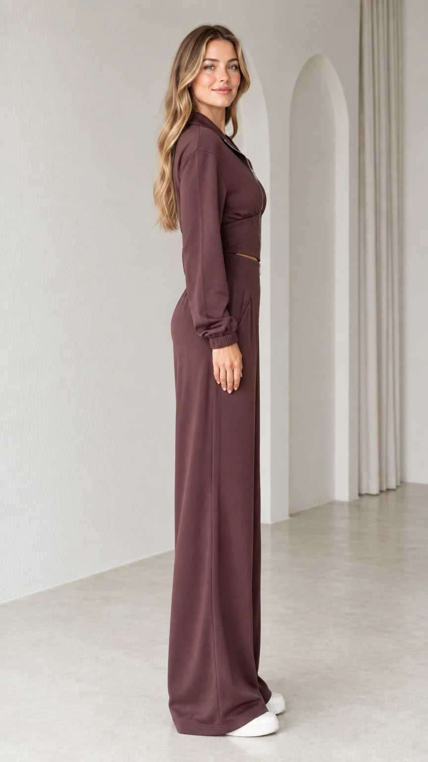 Side full-length view of woman wearing chocolate brown two-piece matching lounge set