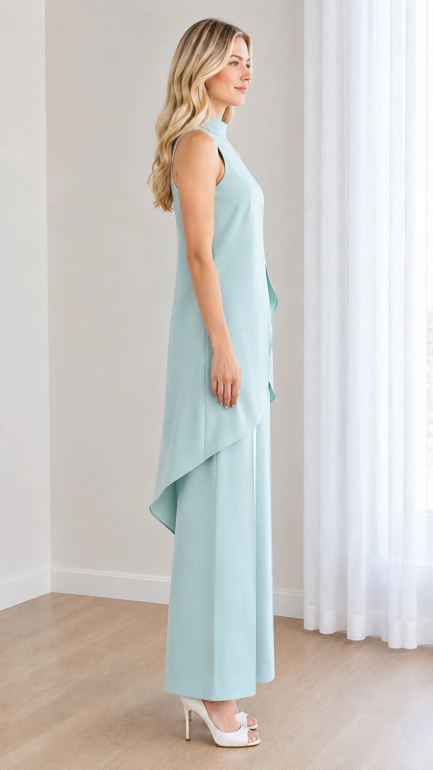 Side profile view of powder blue layered wide leg jumpsuit
