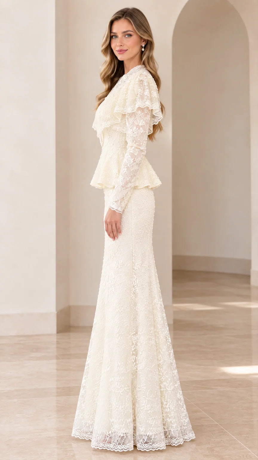 Side profile view of woman modeling the ivory lace formal gown