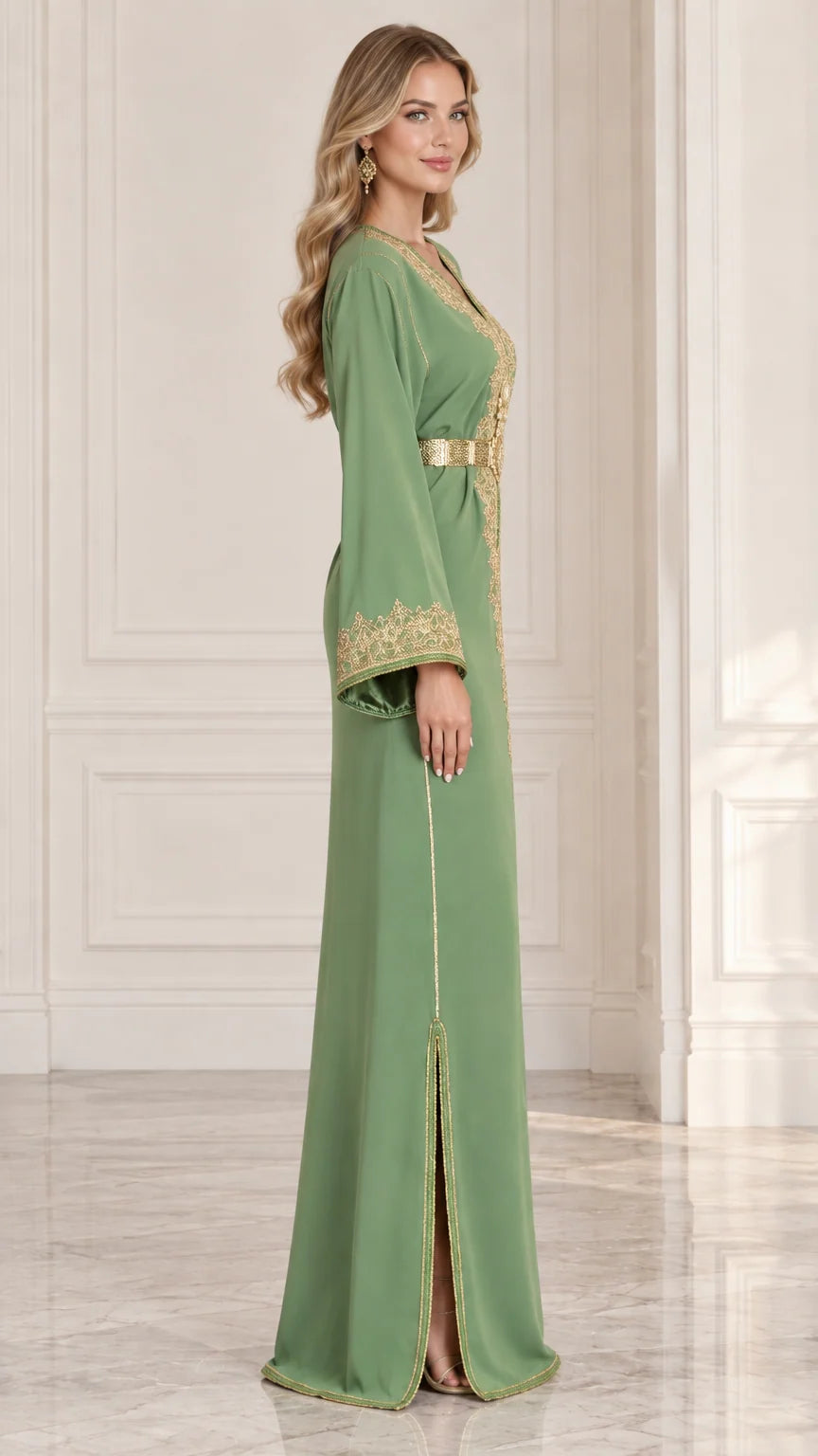 Side angle of model in sage green gold embroidered maxi kaftan gown