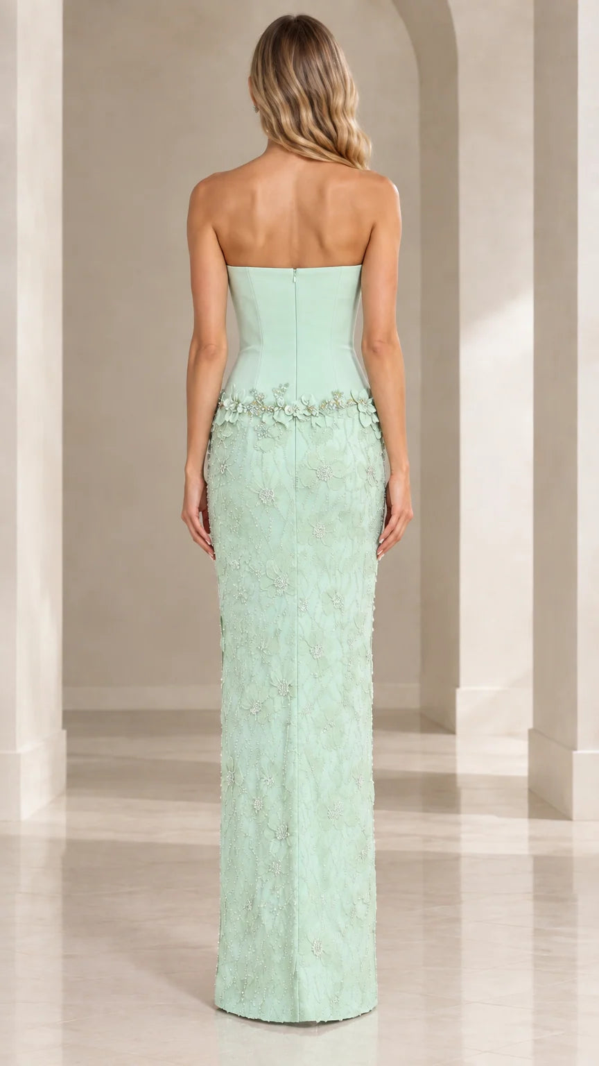 Back view of mint green formal evening gown with fitted back silhouette