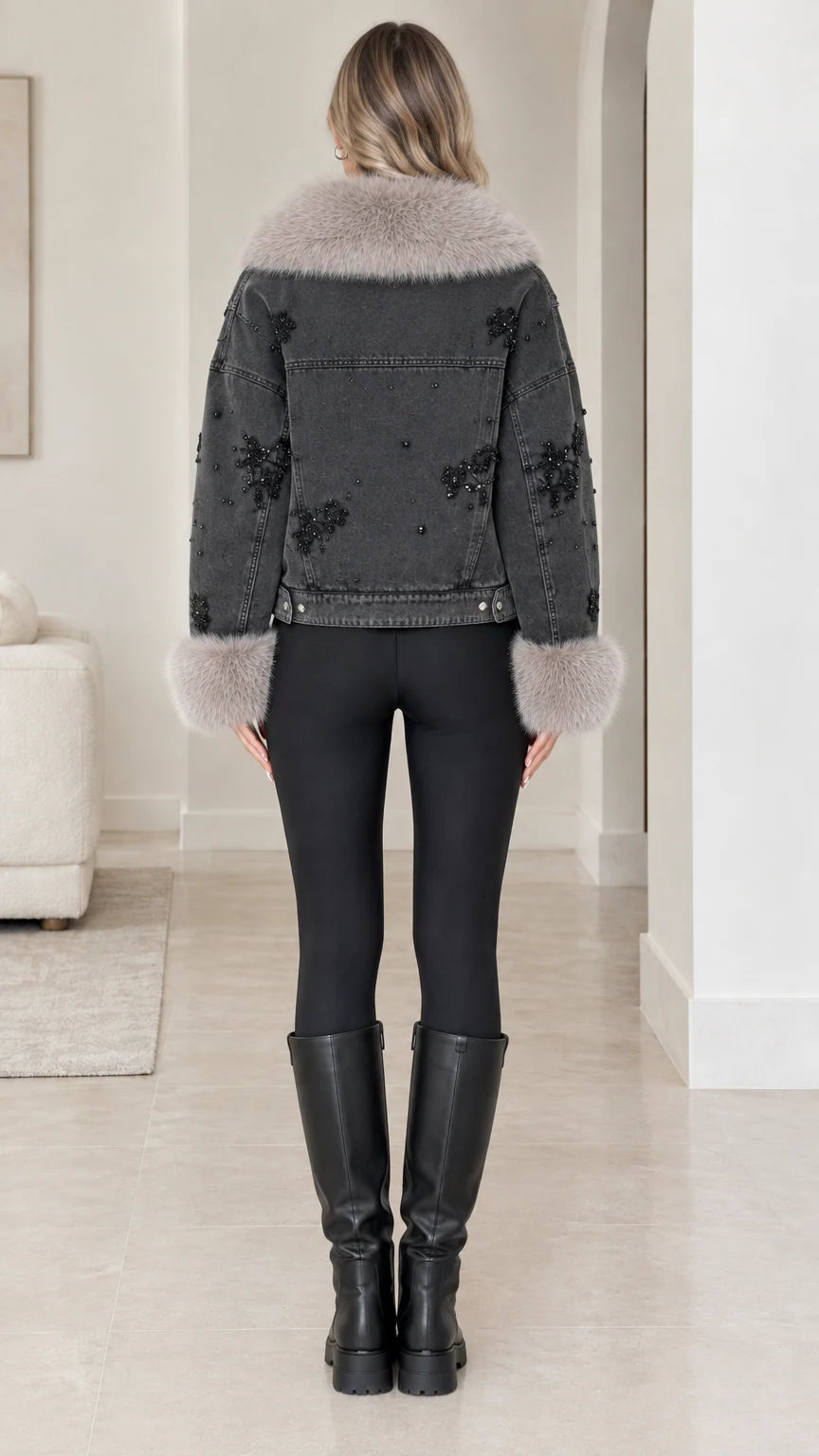 Back view of model wearing Washed Black beaded denim jacket