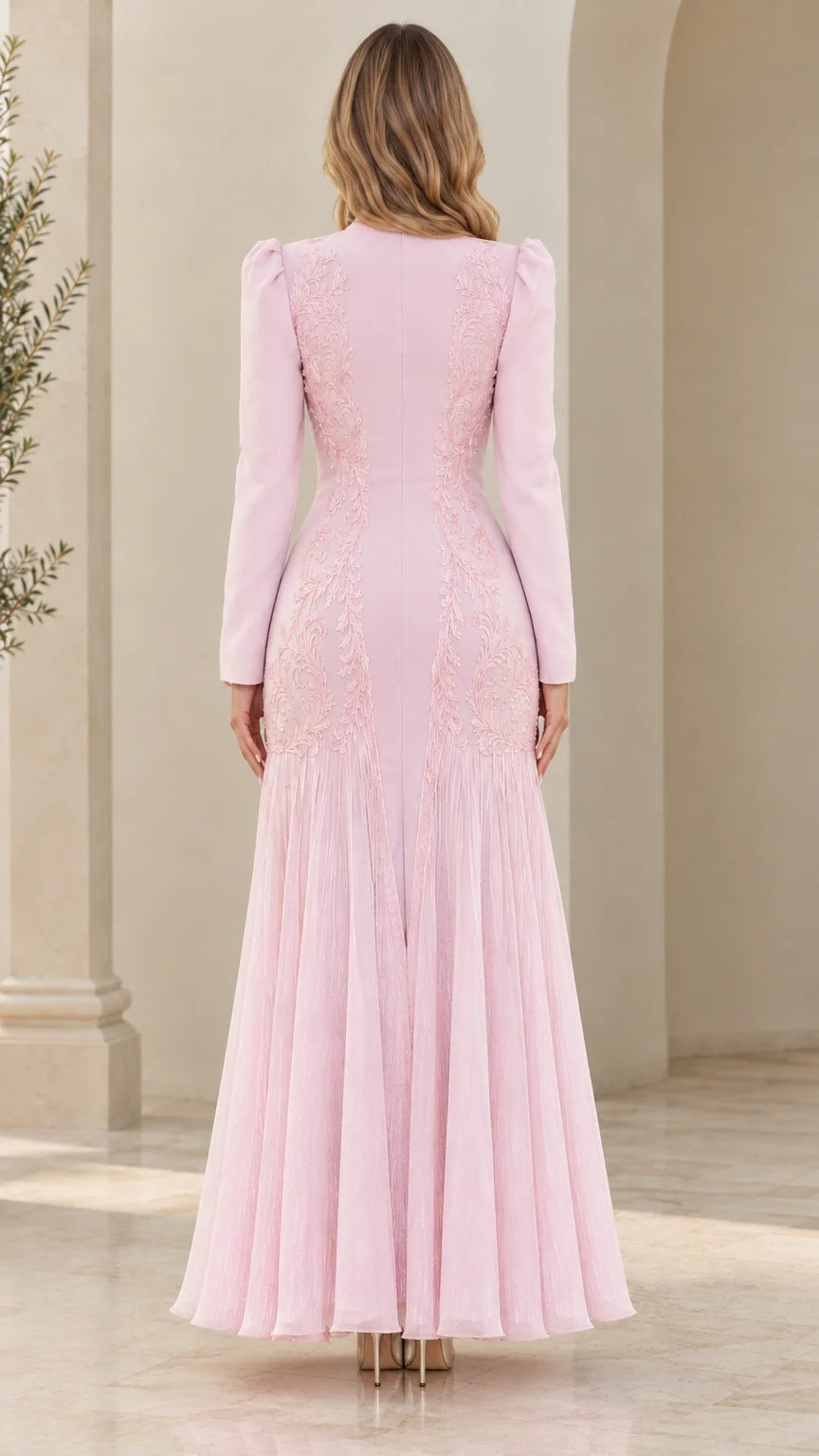 Back full-length view of light pink long sleeve formal evening dress