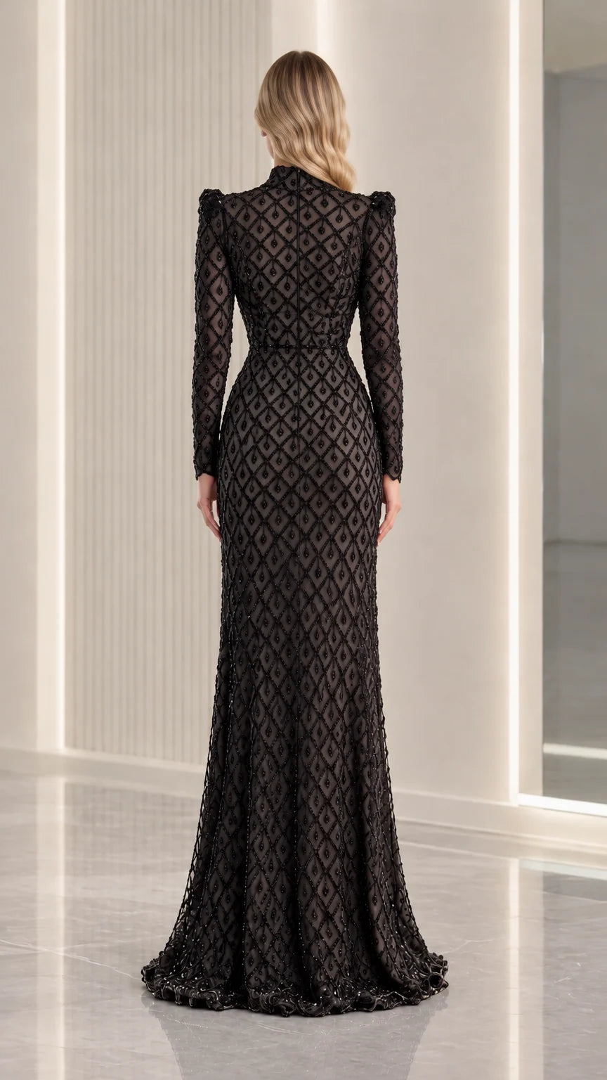 Back view of black long sleeve beaded evening dress with zipper