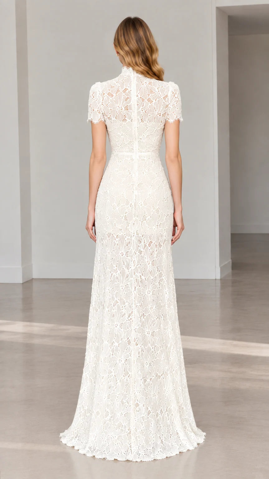 Back full-length view showing the concealed zipper of the ivory lace gown