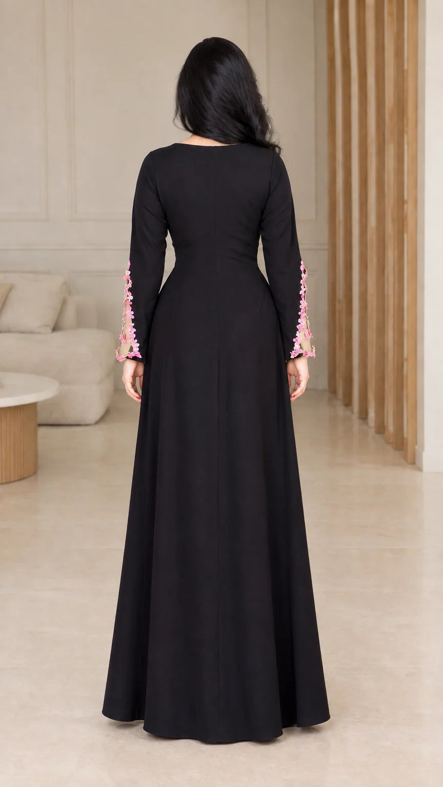 Back view of black long sleeve evening maxi dress
