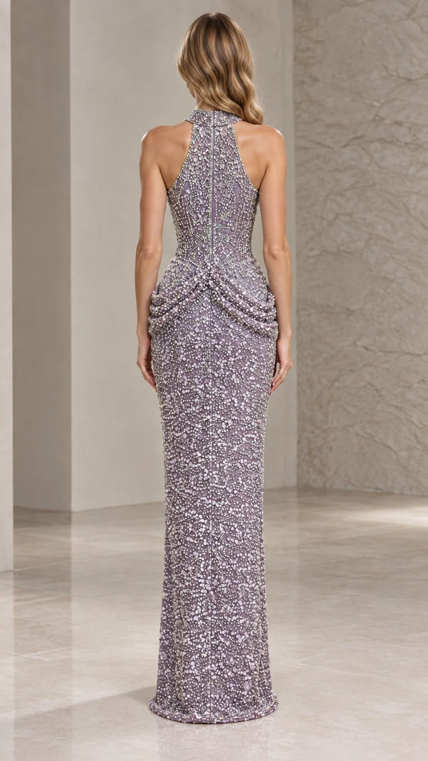 Back view of dusty lilac sequin formal gown showing racer halter cut and zipper