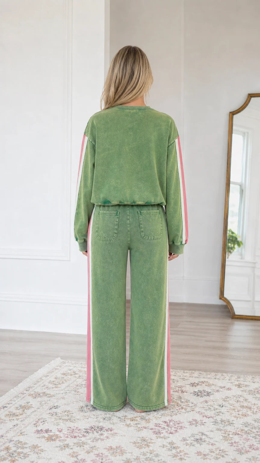 Back view of model wearing the Sage Green wide-leg lounge pants and pullover sweatshirt set