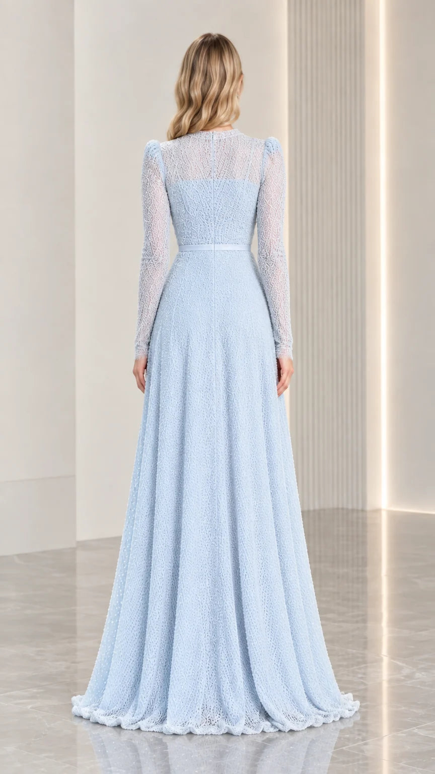 Back view of light blue floor-length illusion gown