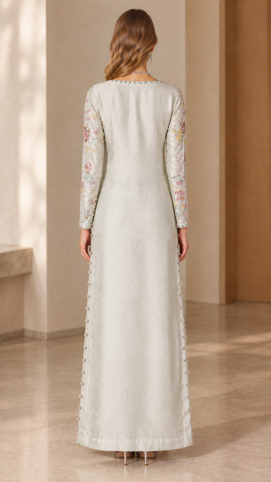 Back view of floor-length silver kaftan dress showing clean drape
