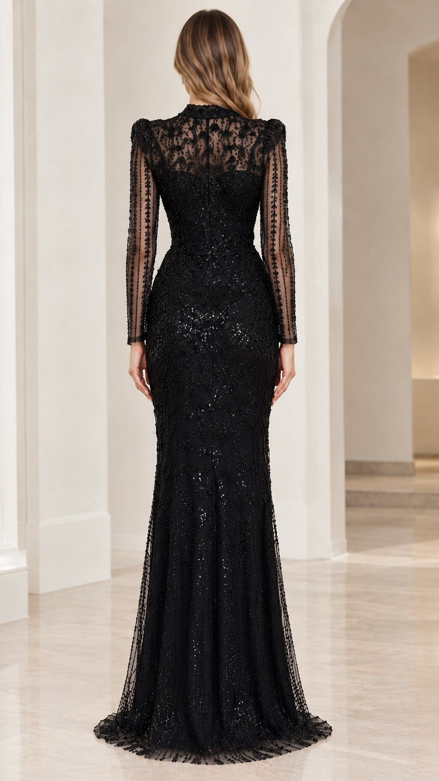 Rear view of black embellished floor-length gown with sheer lace back