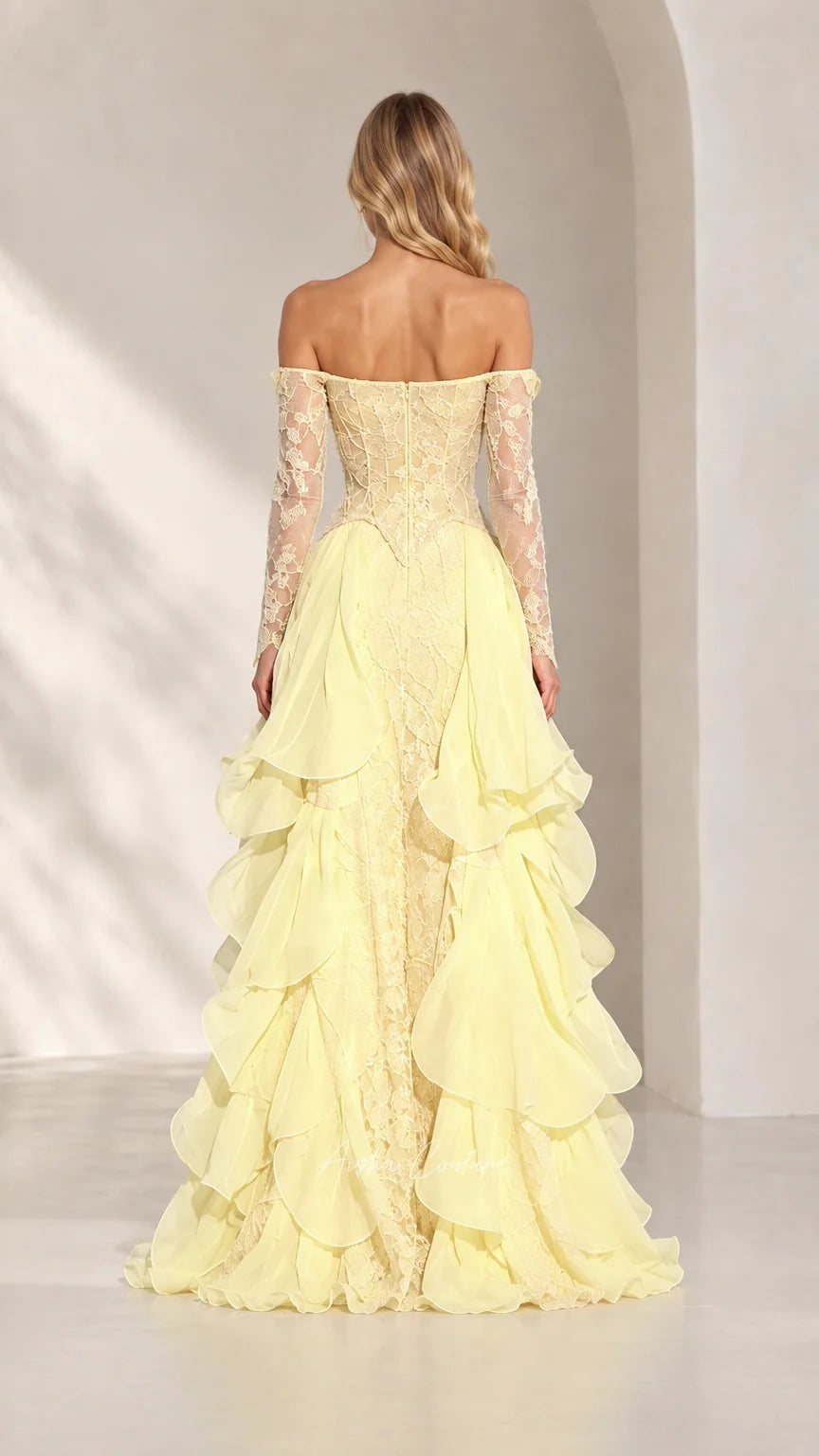Back view of pastel yellow lace corset gown with long sleeves and cascading ruffles