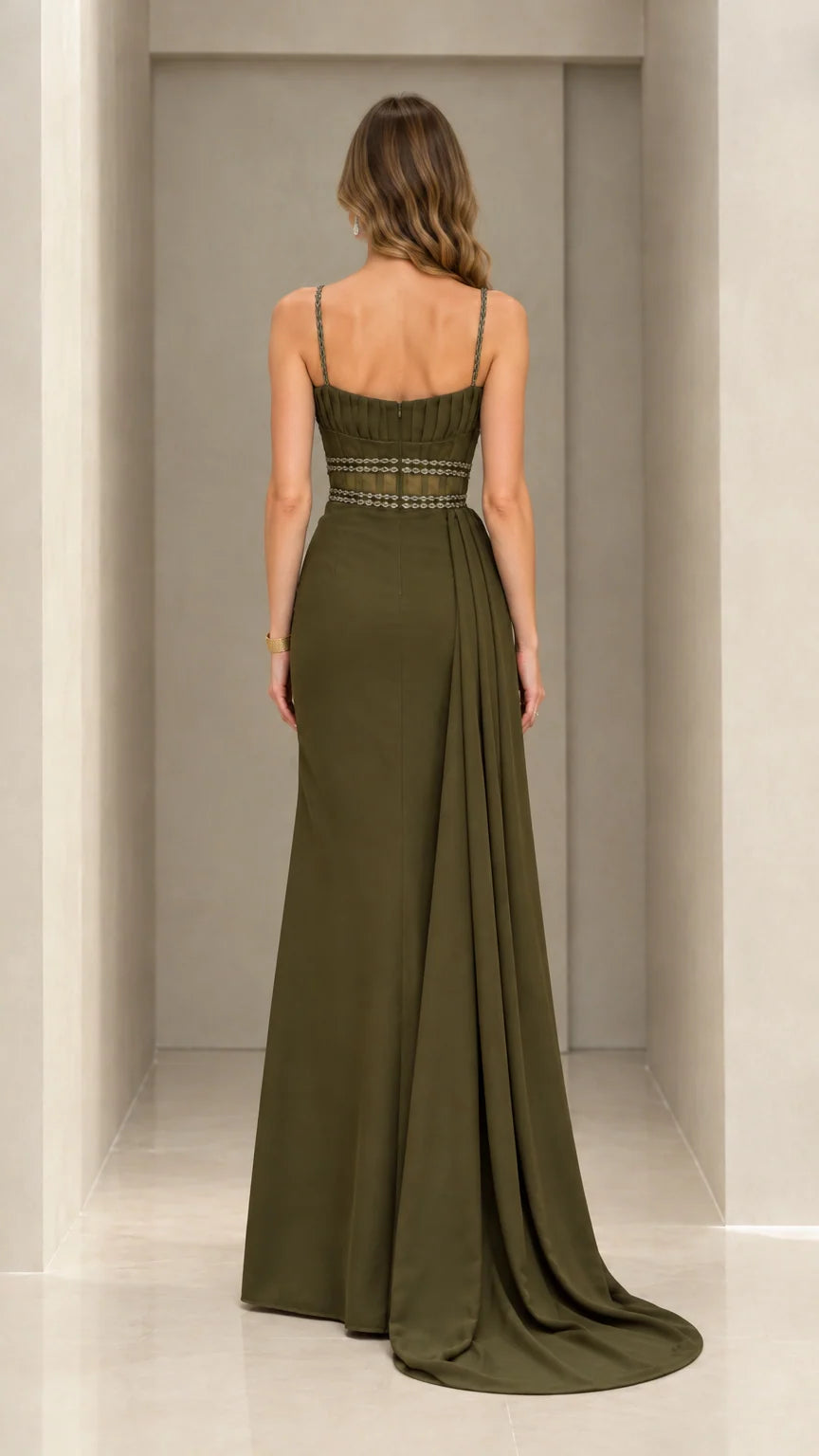 Back view of olive green formal maxi gown with thin straps