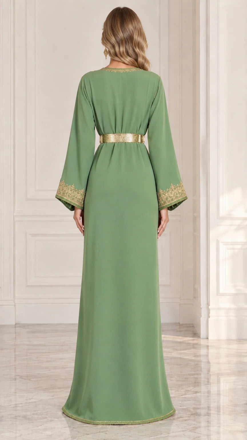 Back view of model wearing sage green evening kaftan dress with gold belt
