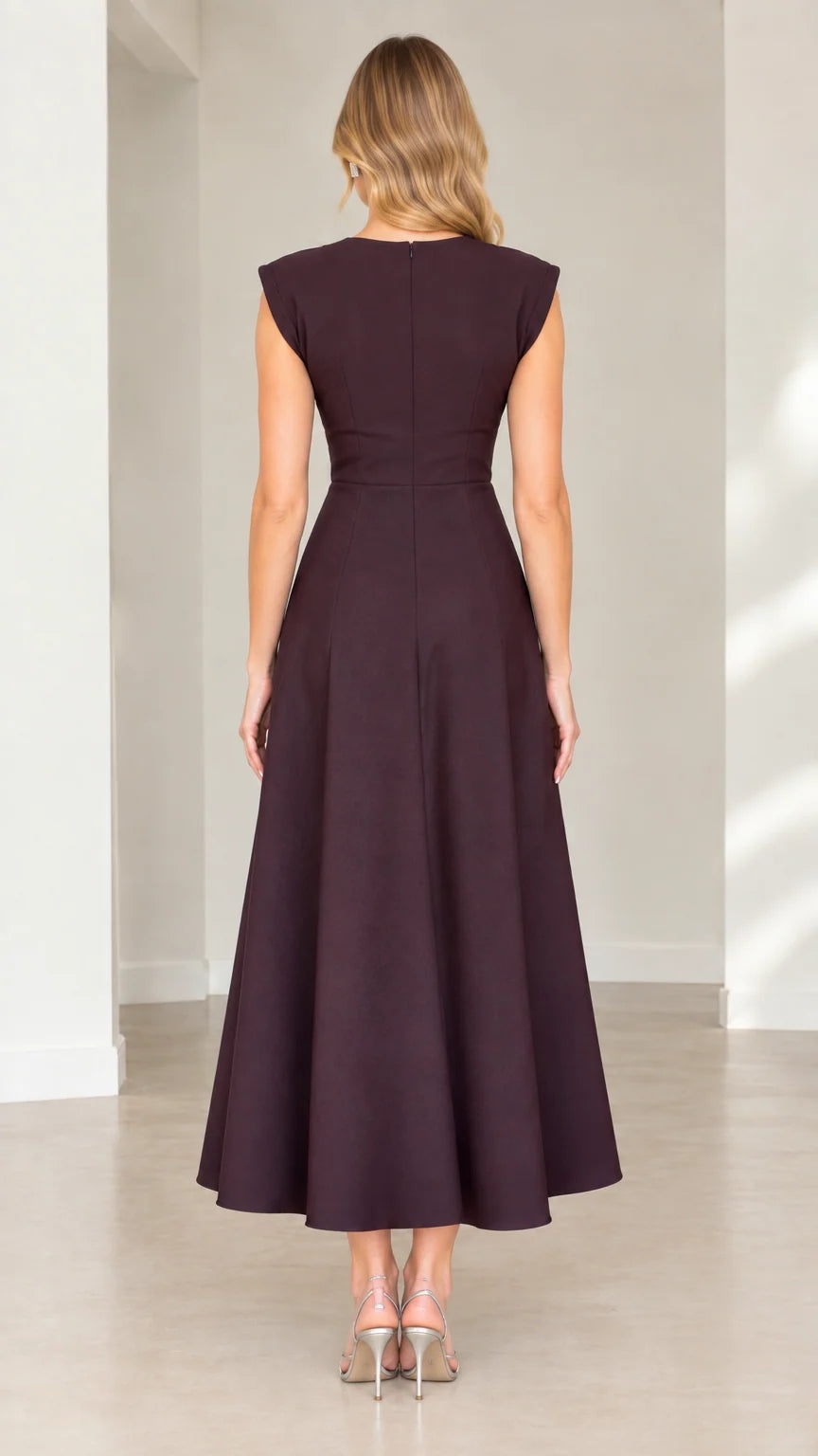 Back view of plum cap sleeve midi dress showing clean tailored lines and zipper closure