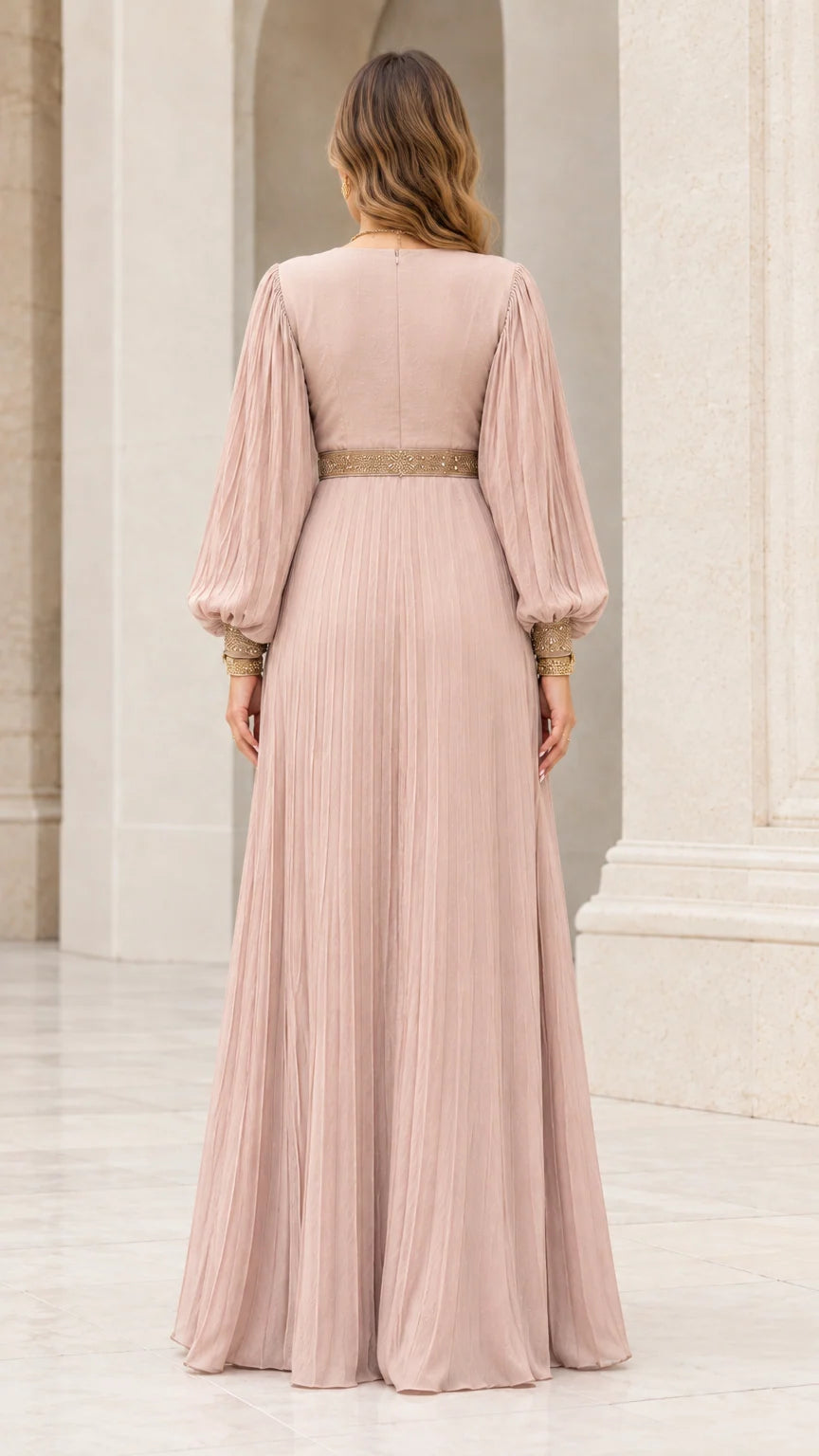 Back view of model in floor-length dusty rose pleated maxi dress