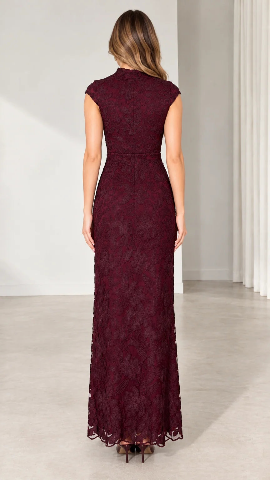 Back view of model in Burgundy floor-length lace formal gown