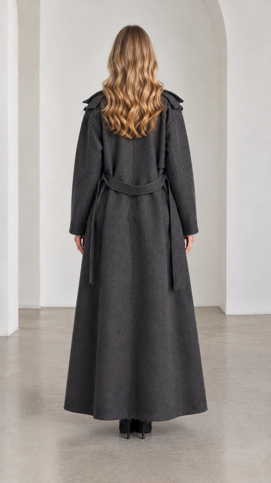 Back view of model wearing Charcoal Grey longline belted trench overcoat