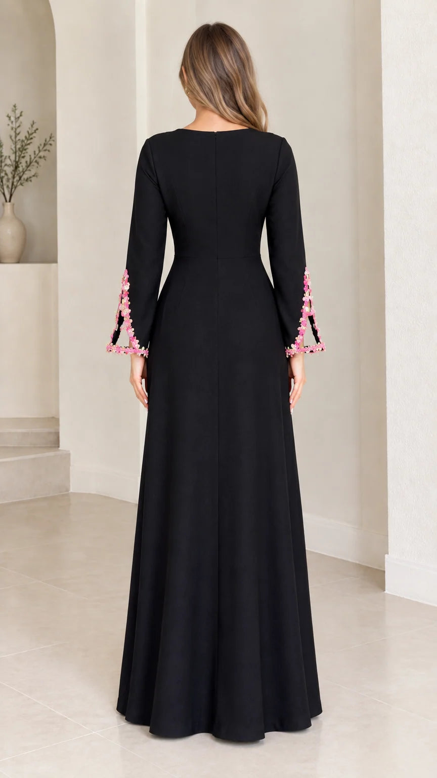 Back view of black long sleeve formal maxi dress