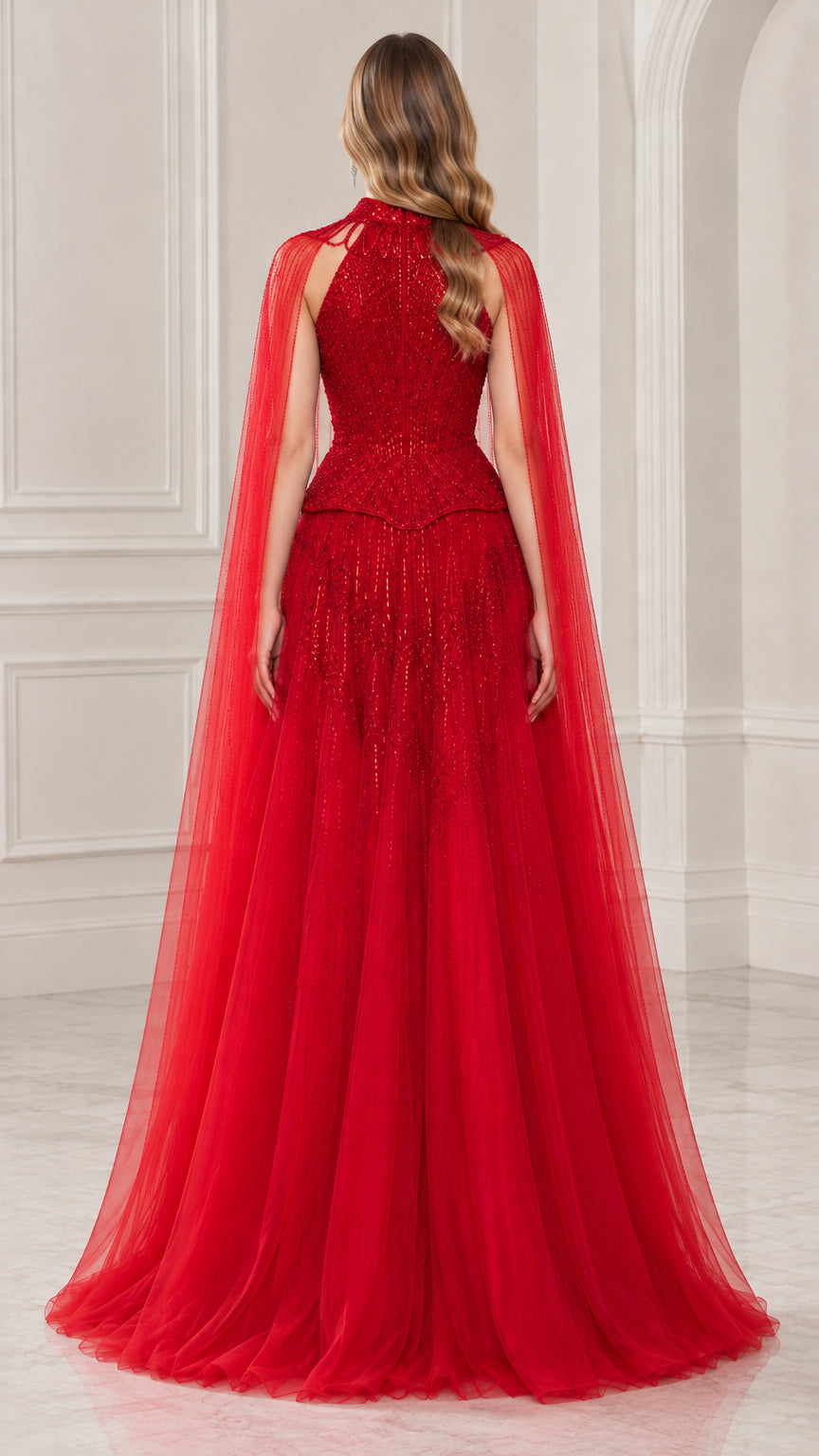 Back view of red beaded evening gown highlighting the sheer cape back