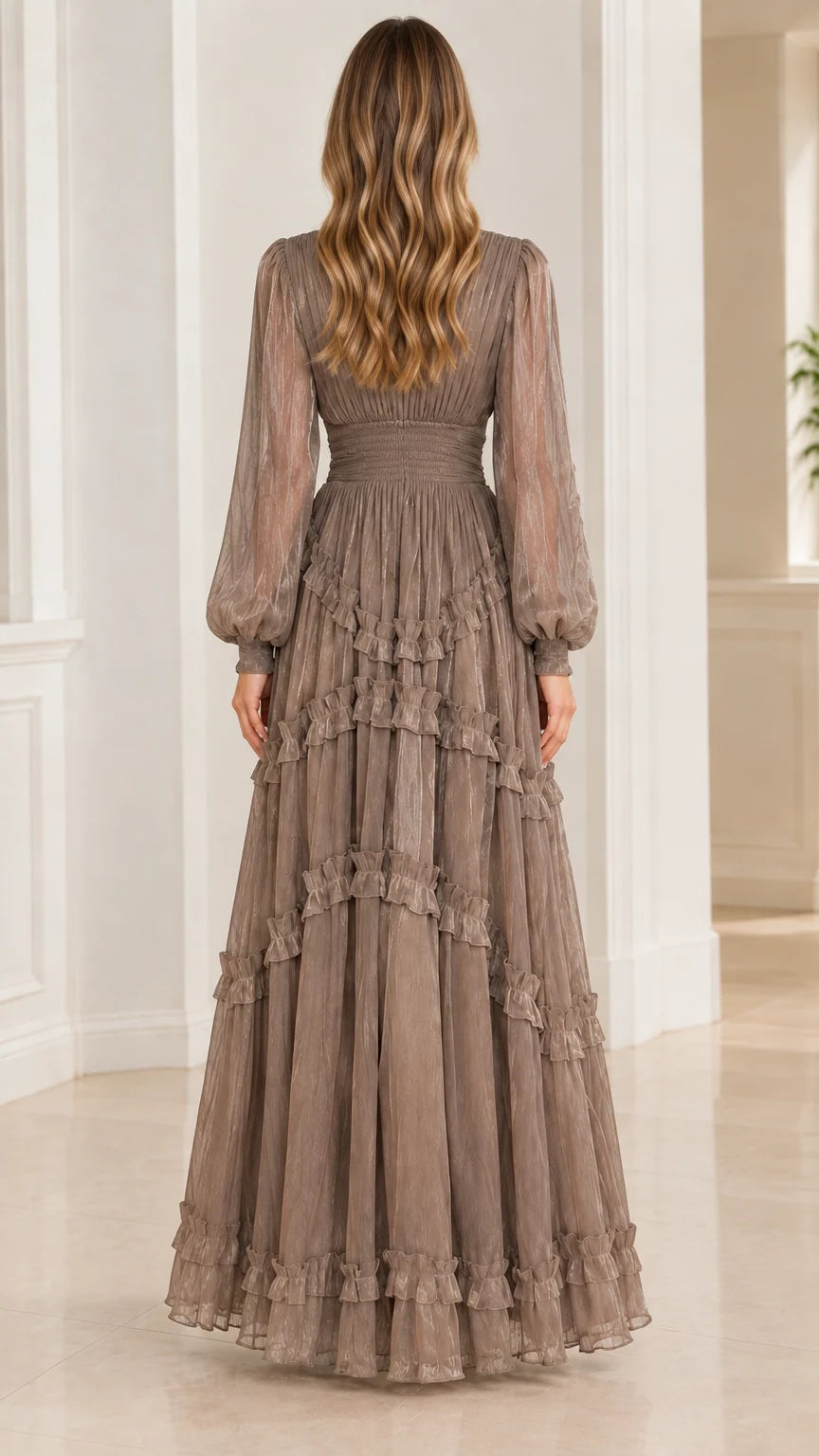 Back view of taupe plissé maxi dress showing tiered ruffled skirt flow