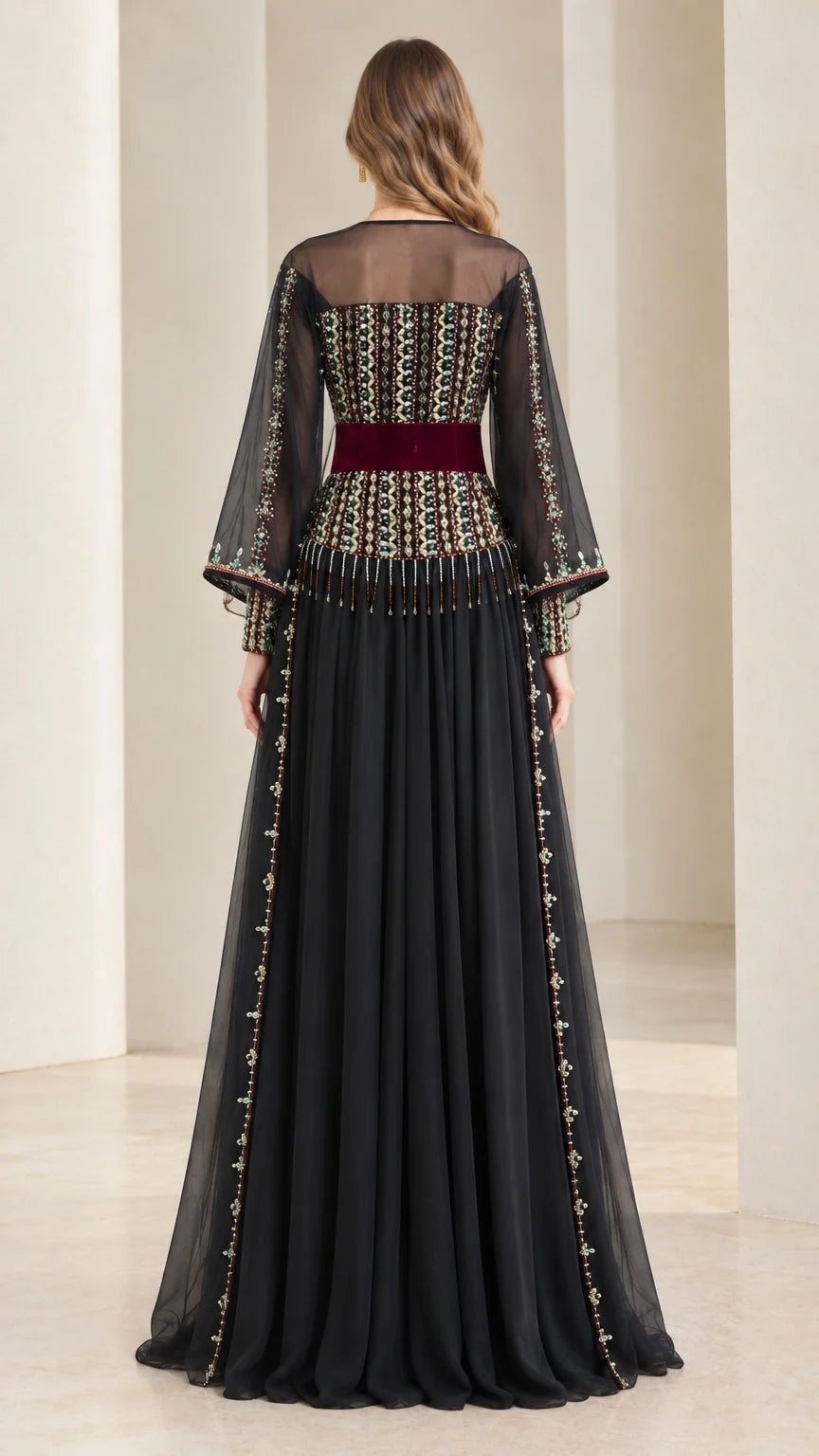 Back view of black floor-length beaded evening dress