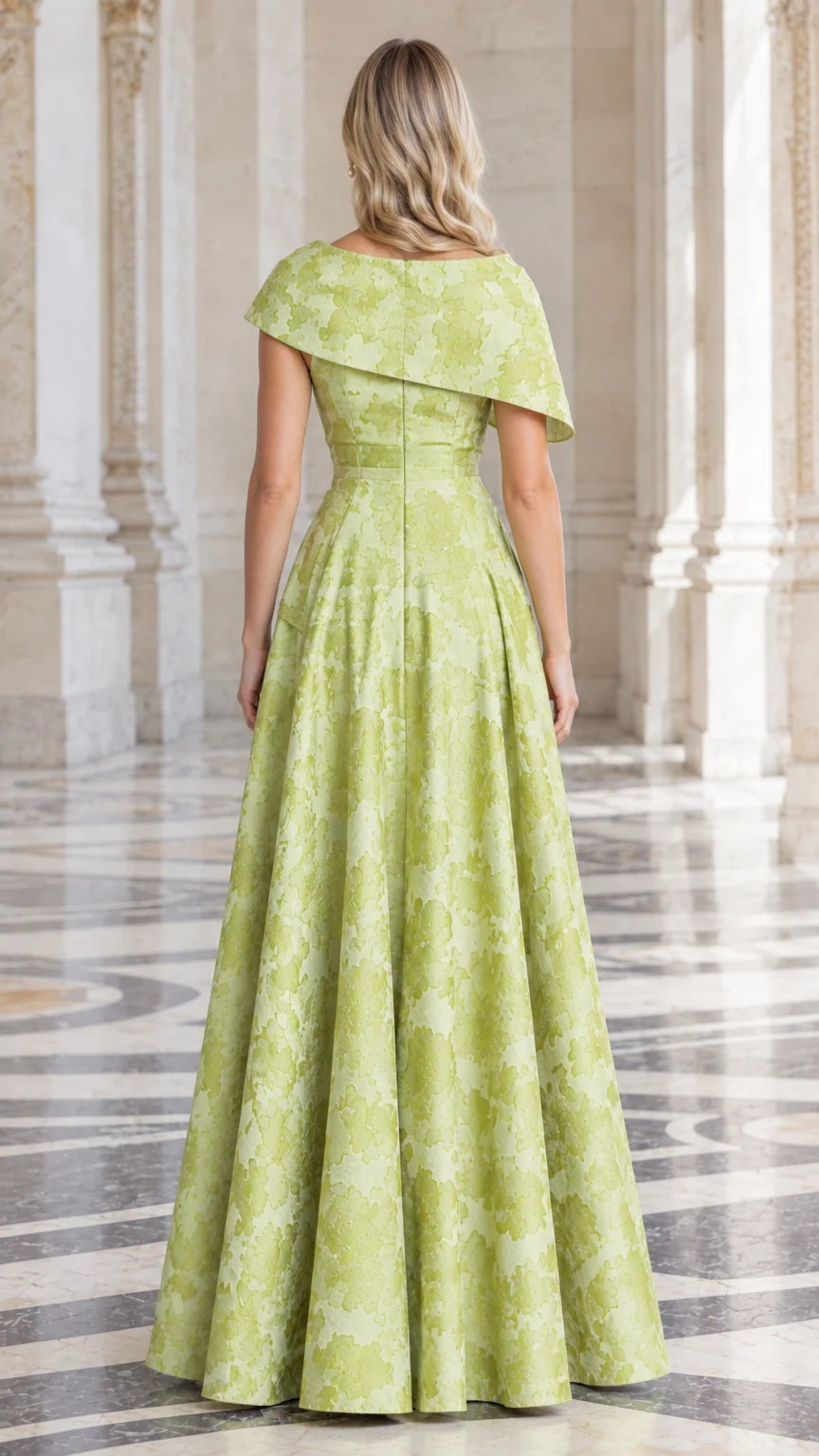Back view of Lime Green floral jacquard formal gown with elegant drape