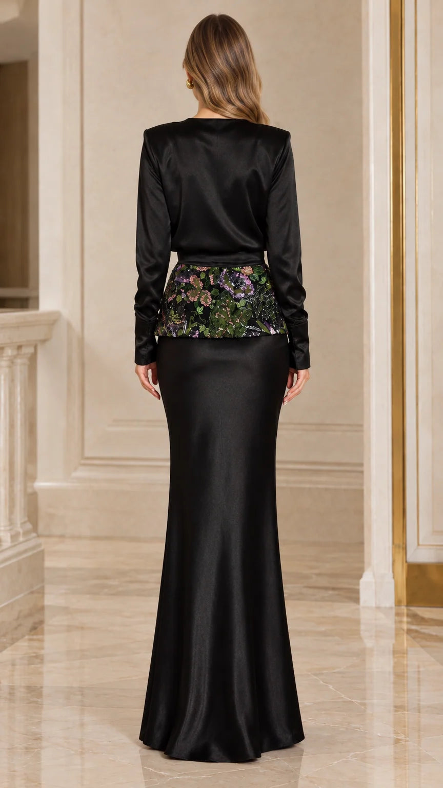 Back full-length view of black satin long sleeve maxi dress