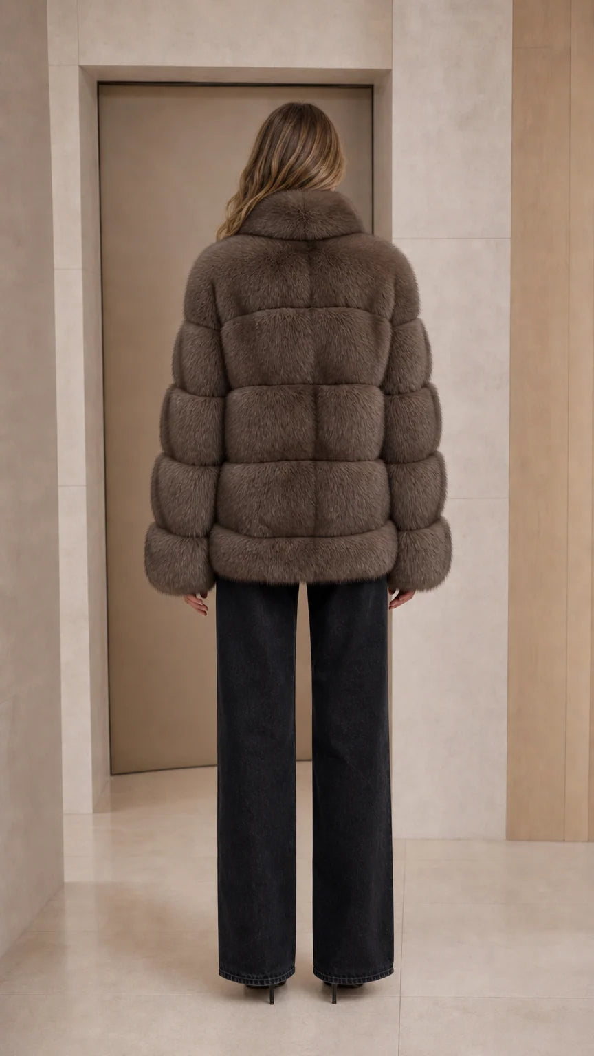 Back view of taupe horizontal paneled faux fur winter jacket