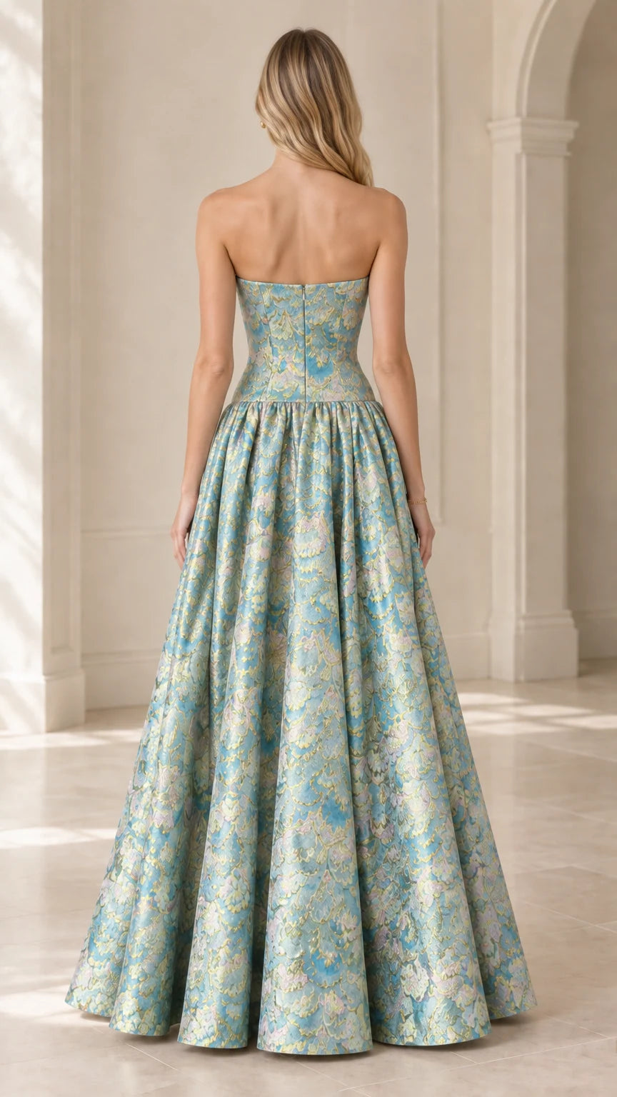 Back view of strapless aqua blue brocade ball gown showing fitted bodice and zipper
