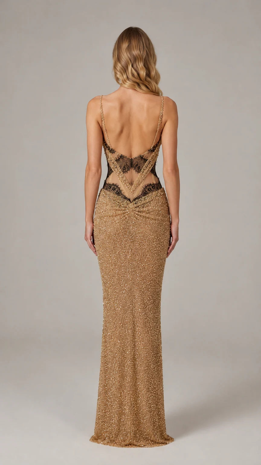 Back view of gold beaded evening gown highlighting low back and lace accents
