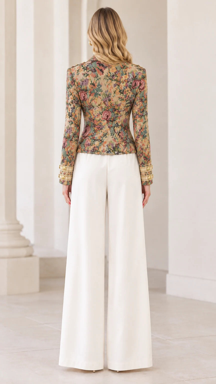 Back view of model showing tailored fit of Multi Floral tapestry military jacket