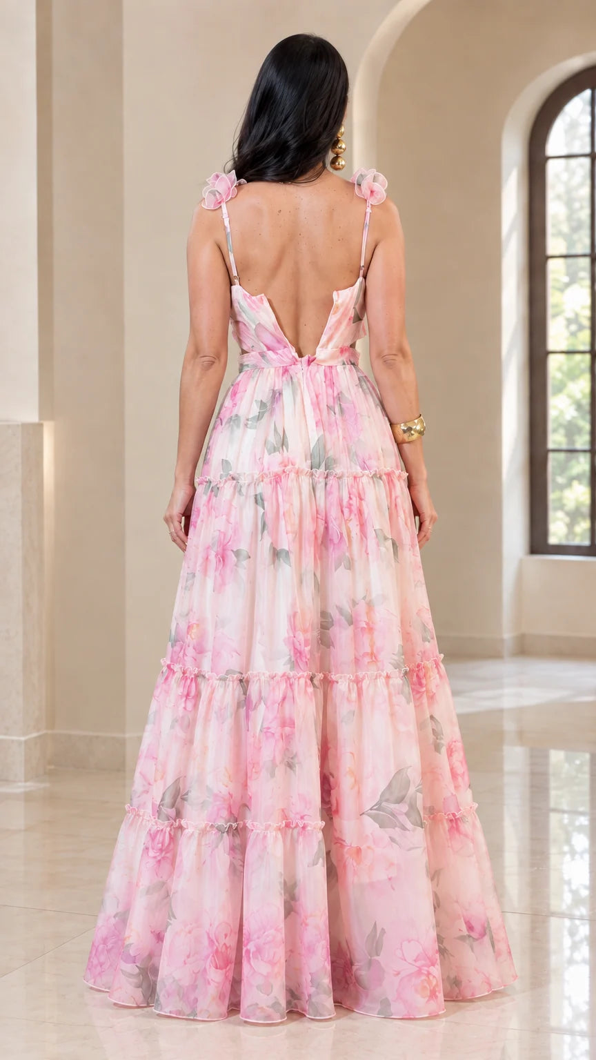 Back view of model wearing Blush Pink floral maxi dress showing low open back