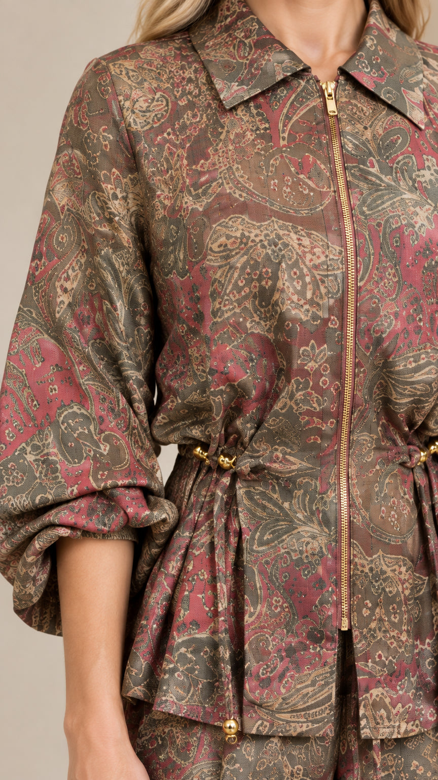 Close-up detail of Olive Multi paisley top showing collar, zipper, and adjustable waist ties