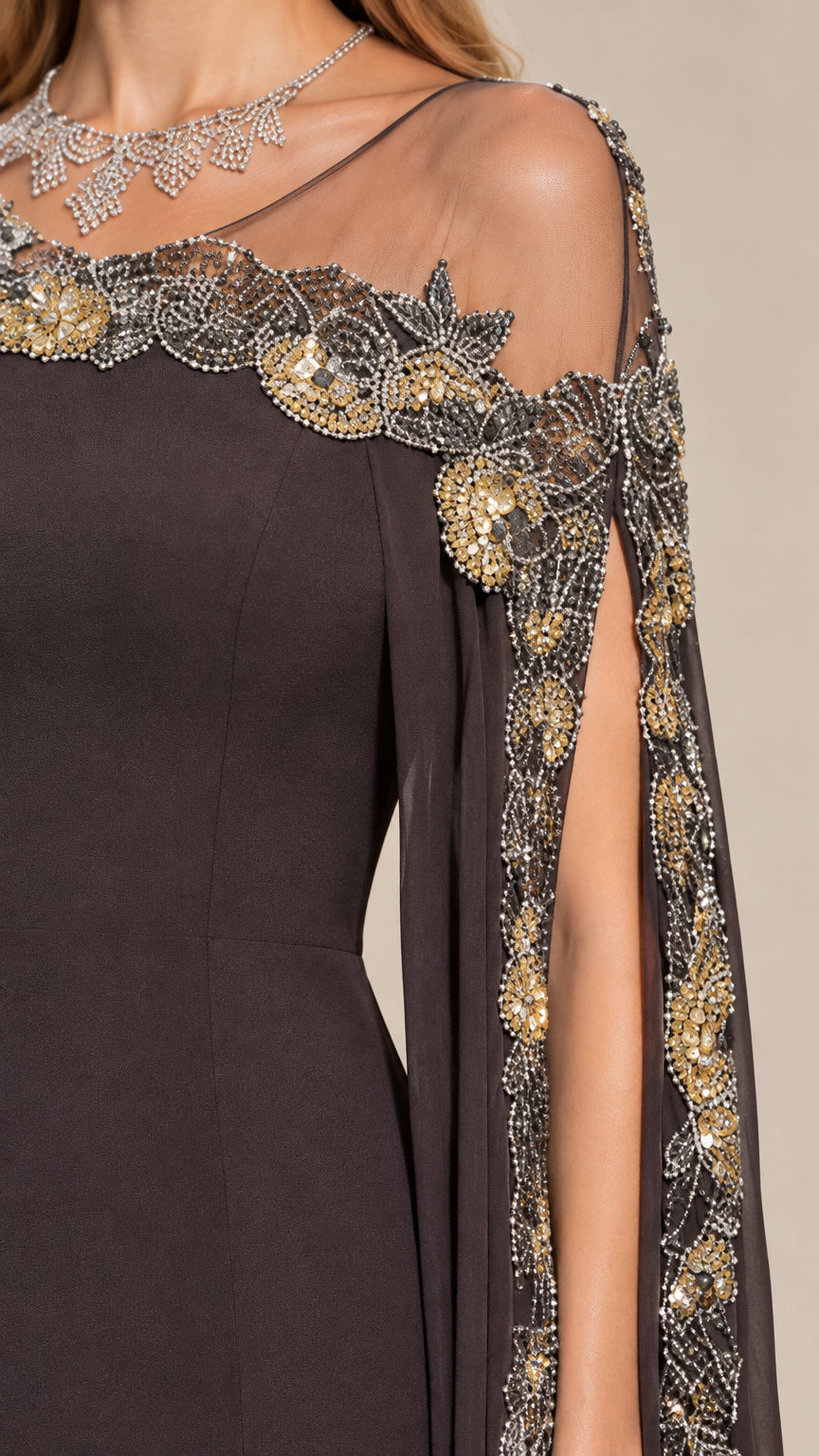 Close-up of intricate metallic floral embroidery and beadwork on sheer illusion neckline