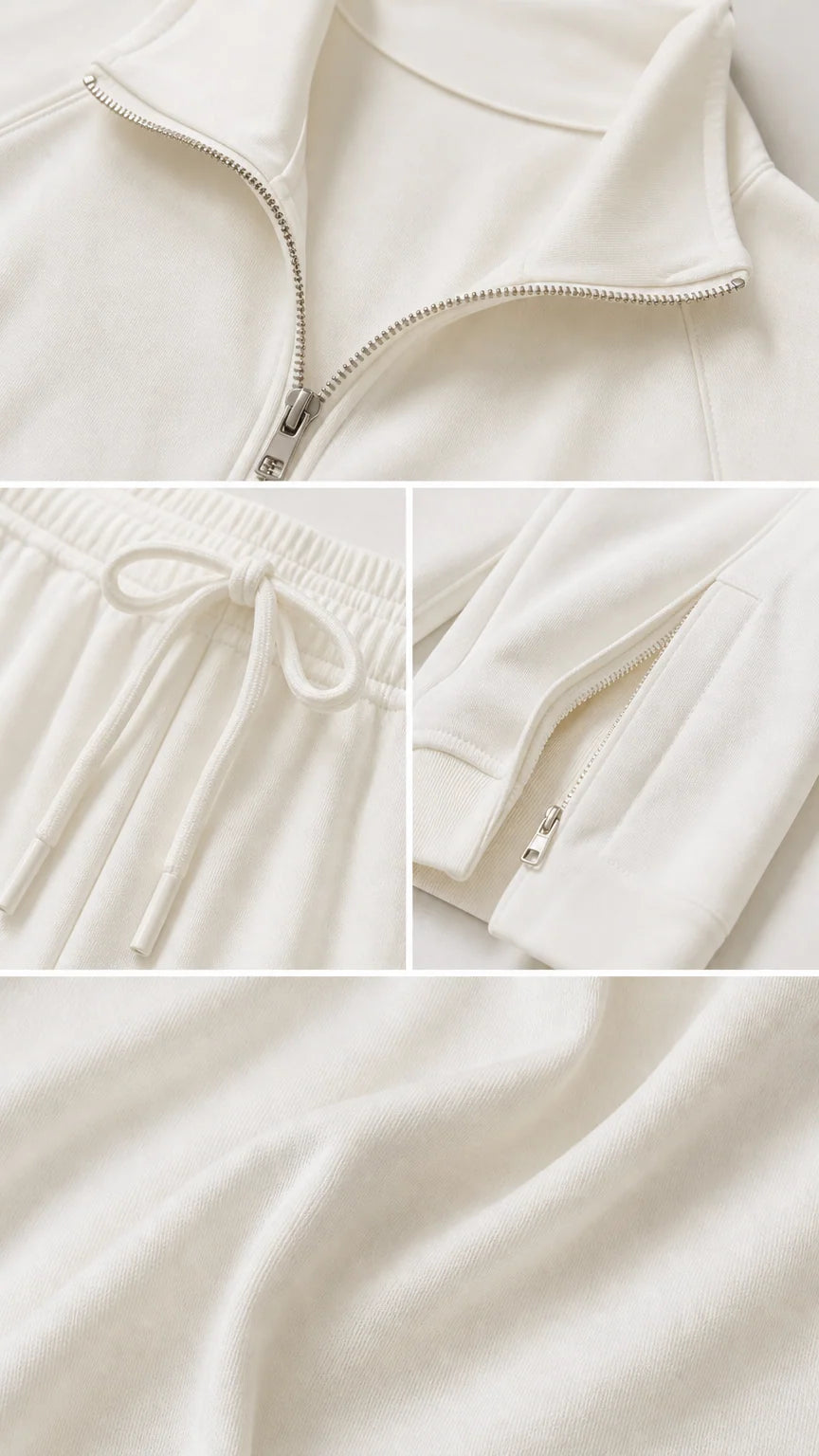 Close-up details of off-white tracksuit zipper, drawstring waistband, and soft fabric texture