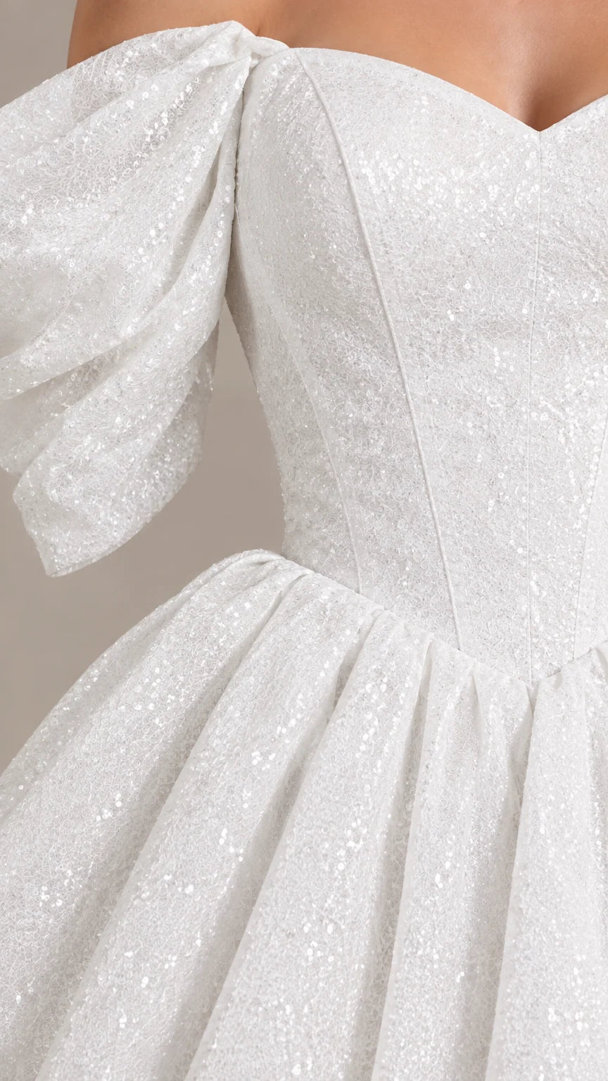 Close-up of sparkling fabric texture and structured sweetheart bodice