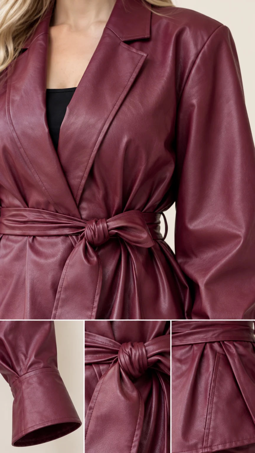Close-up details of Burgundy faux leather notched lapel, tie belt, and tailored cuff