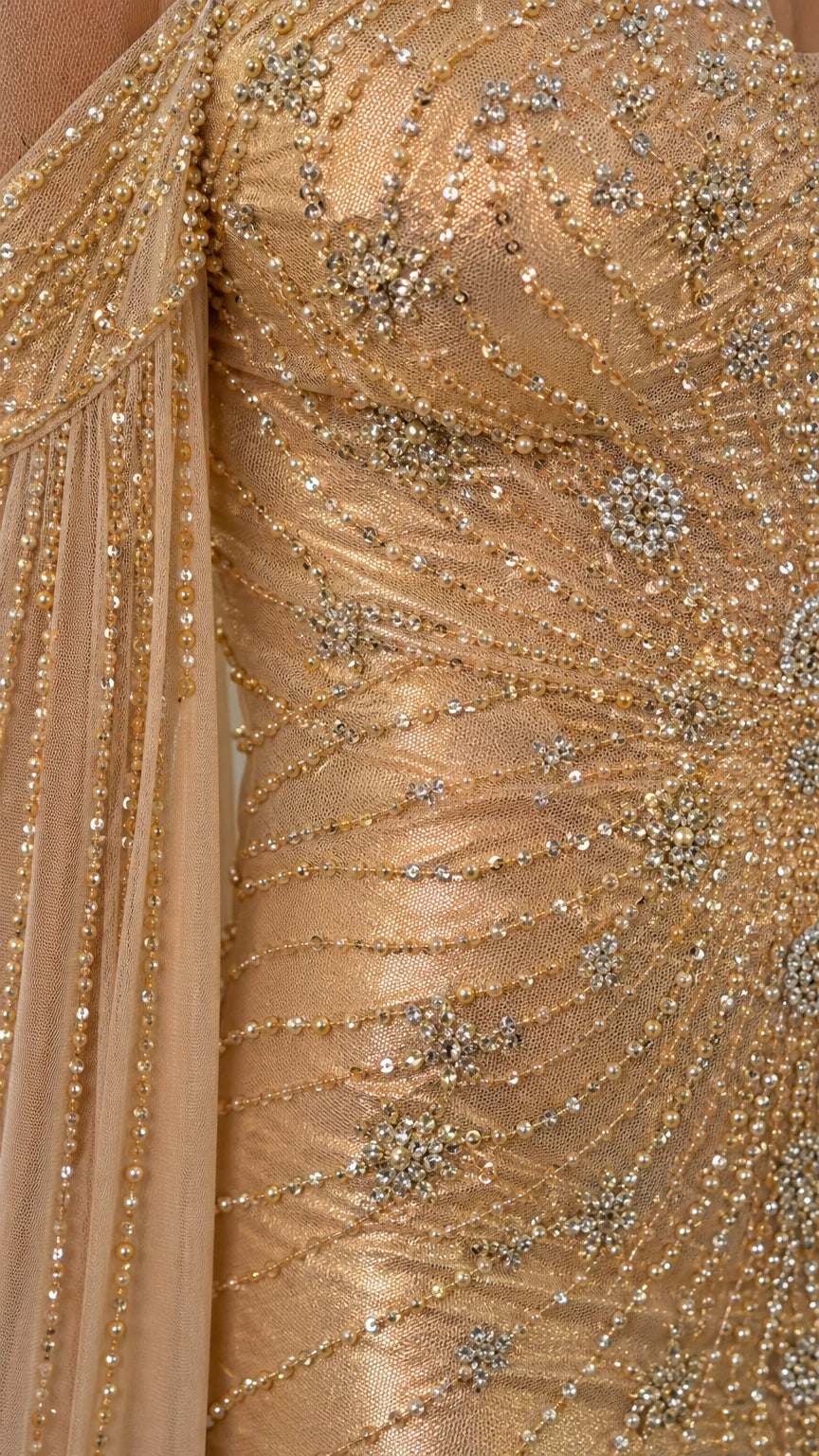 Close-up detail of beadwork and sequins on the dress